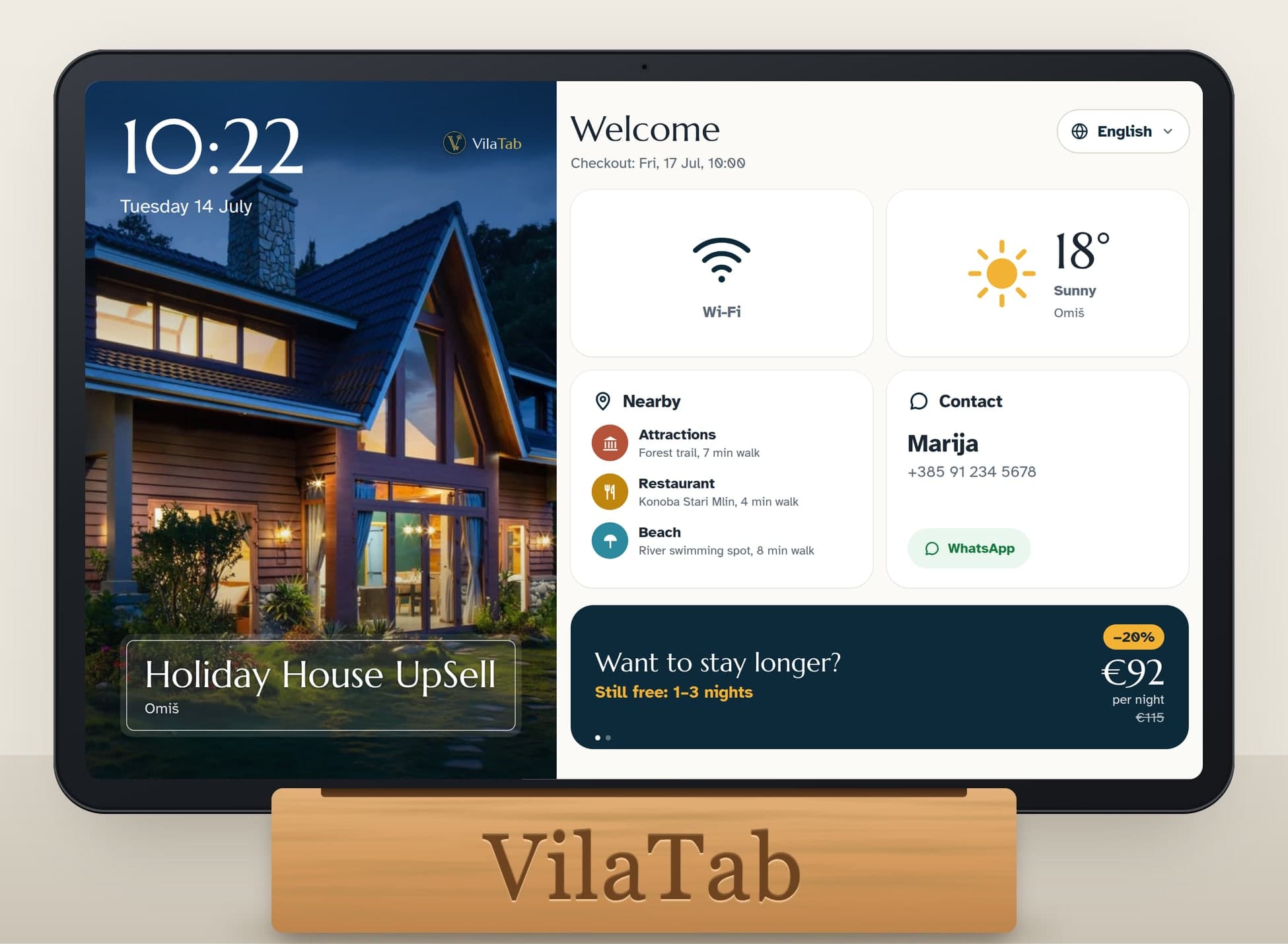 The VilaTab tablet on its wooden stand, showing Wi-Fi, weather, nearby places, the host’s contact and an offer to stay longer
